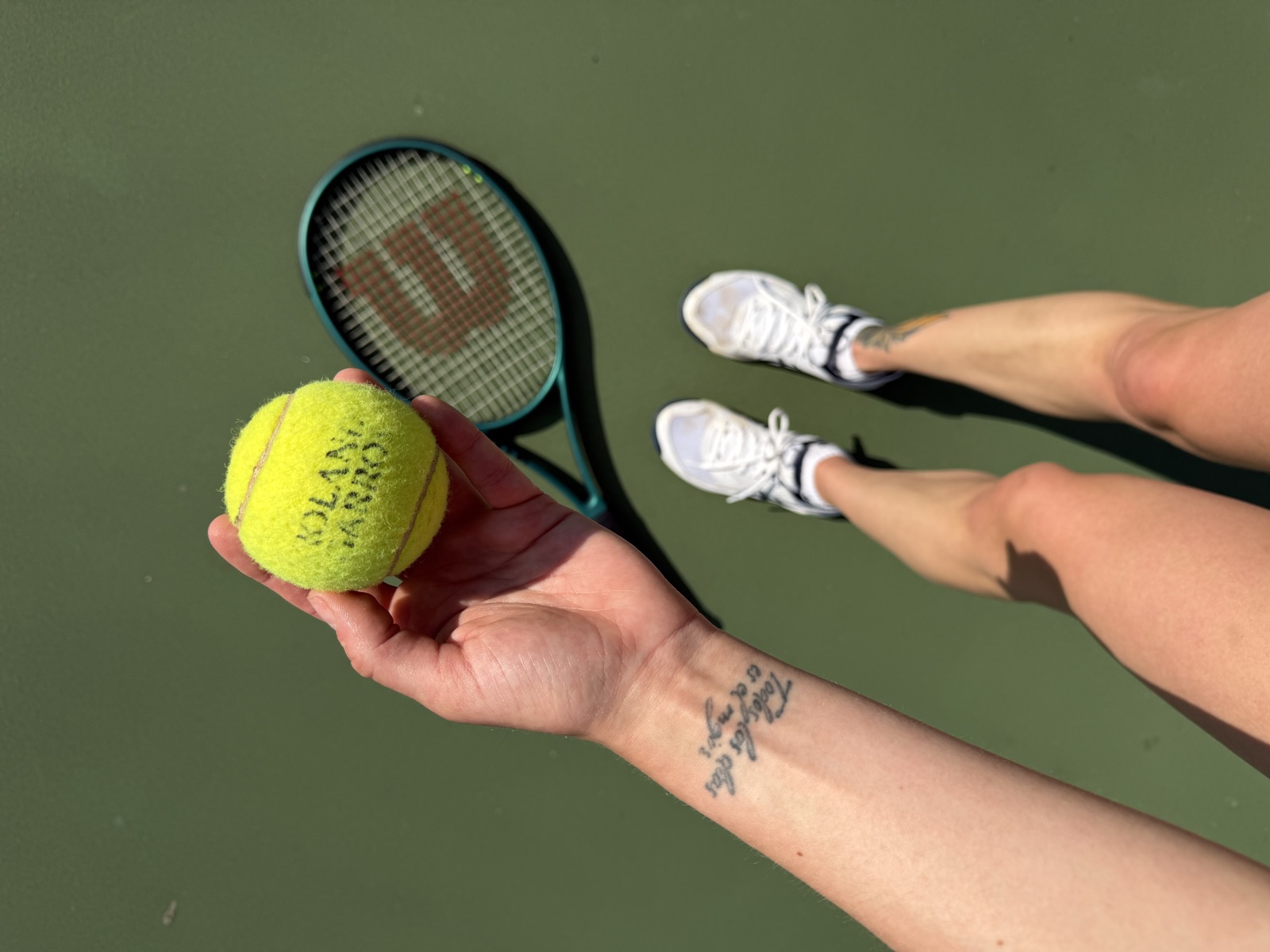 Tennis ball and racket